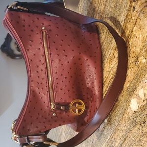 Beautiful fake ostrich handbag.